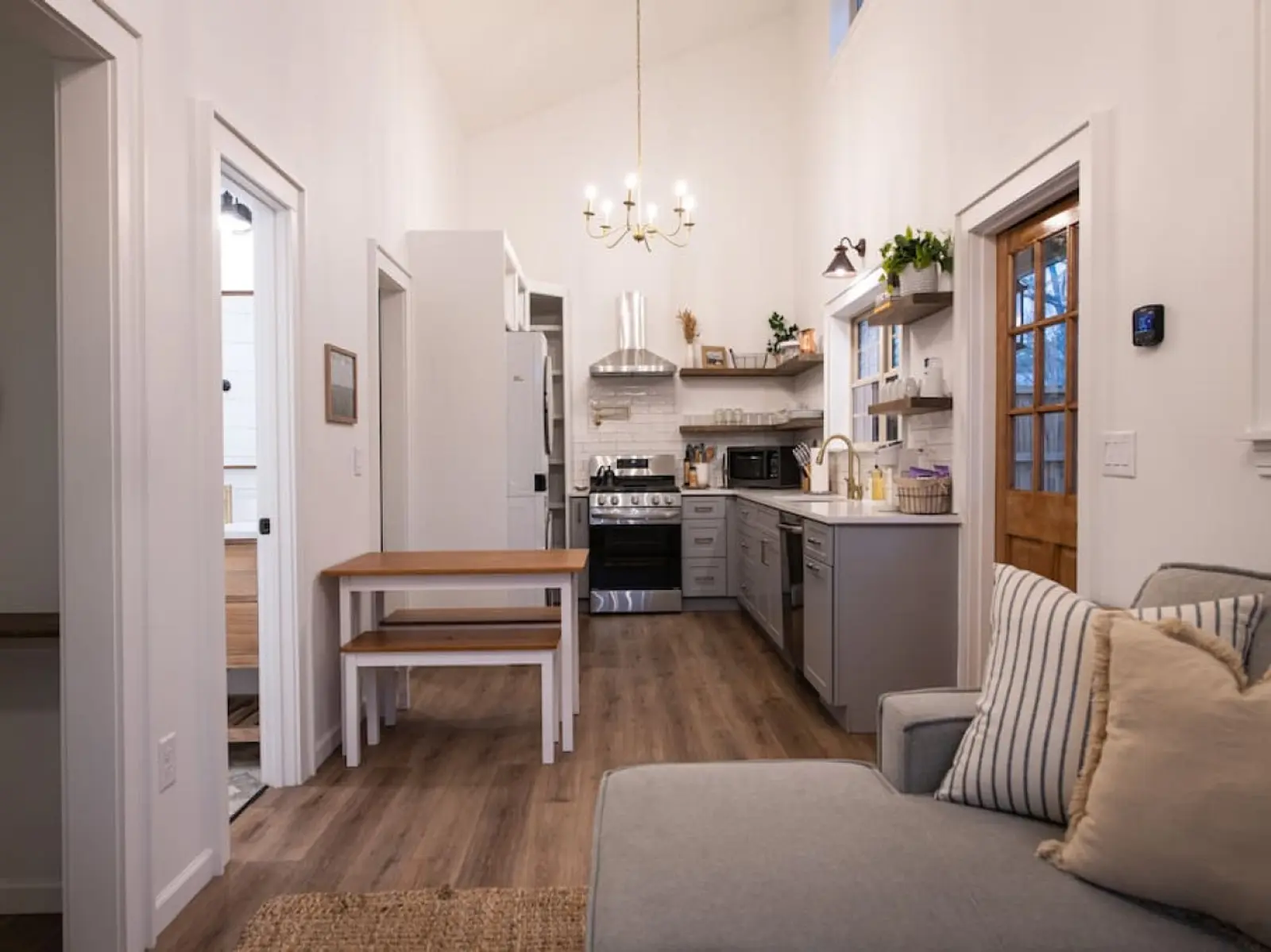 Cozy Cottage open living area with kitchen and dining nook