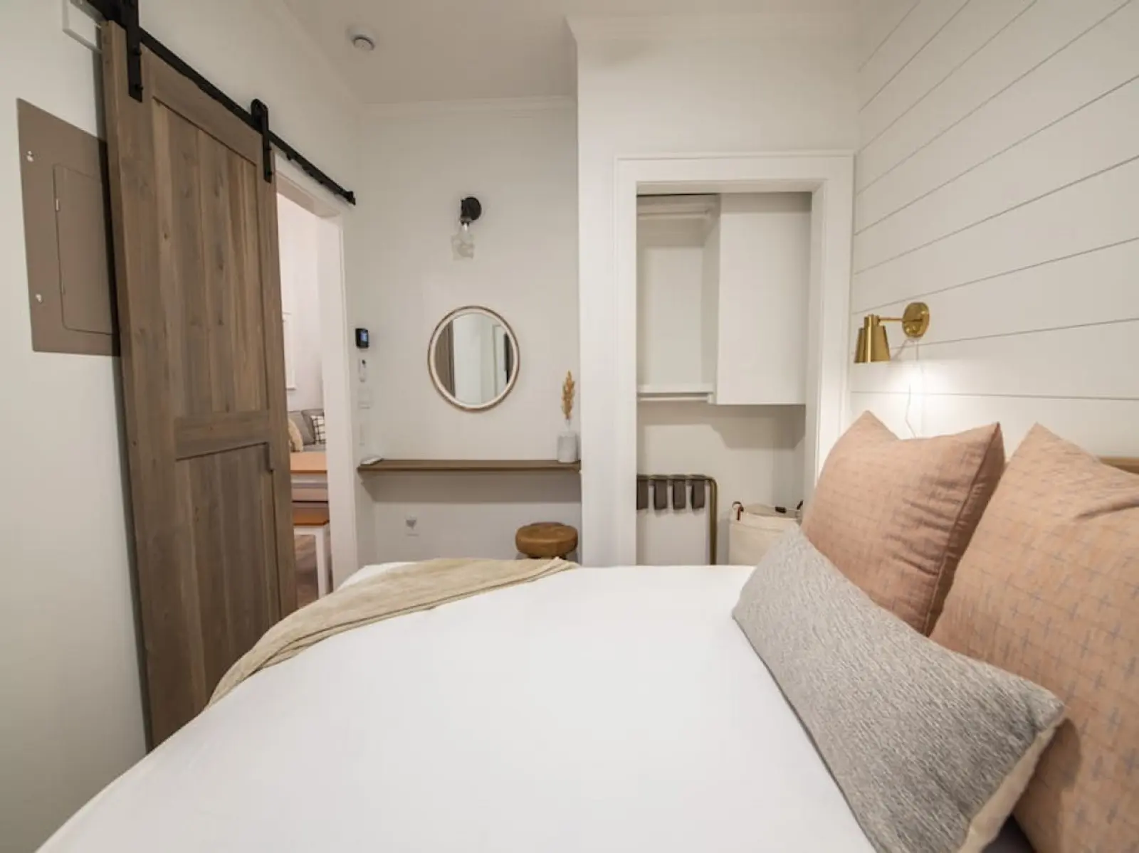 Cozy Cottage bedroom with a sliding barn door