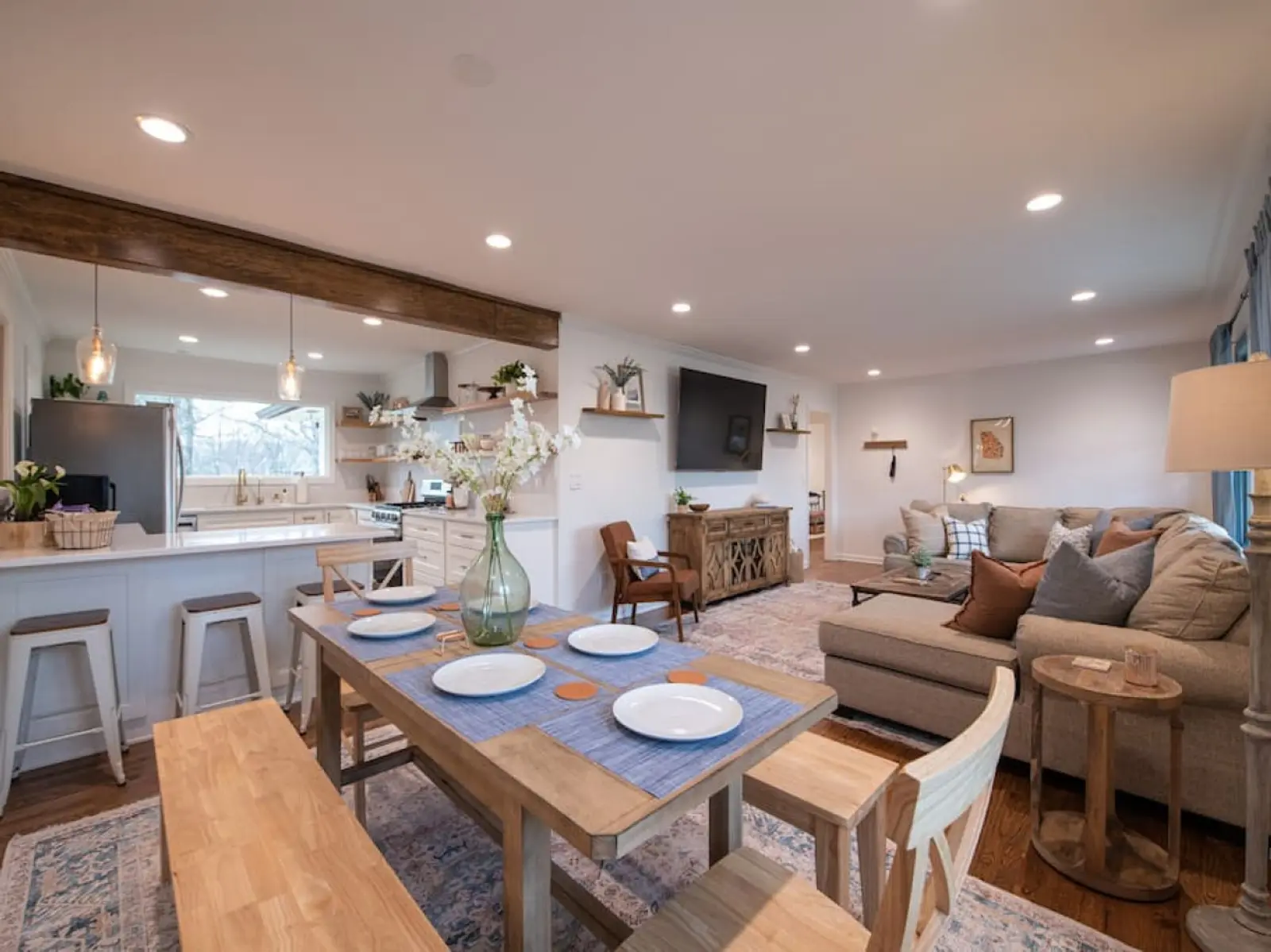 Crossing House open-plan dining table, kitchen island and living room