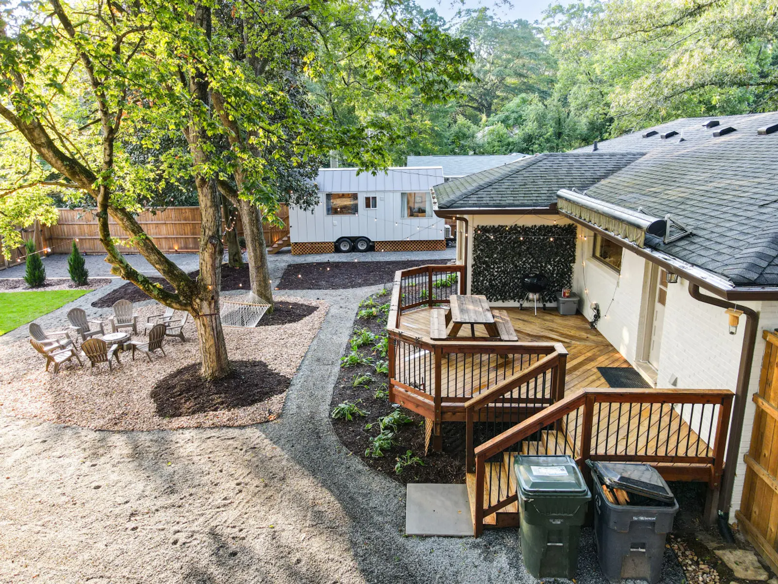 Aerial view of the Crossing House deck, grill and shared yard